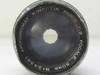 Kinoptik Paris Apochromat 50mm f/2 C-mount lens — front element view showing 'APOCHROMAT KINOPTIK PARIS F:2 FOCALE 50mm No 24391' engraving and visible fogging on front glass element