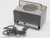 Hollywood Film Sound Reader rear/side view showing large perforated speaker grille, carry handle, and attached 2-prong AC power cord