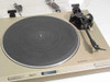 Pioneer PL-4 top-down view with dust cover open showing rubber platter mat, tonearm, and front panel controls