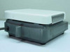 Corning Stirrer/Hotplate right-side and rear view showing gray cast body, rubber feet, and power cord
