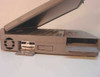 Toshiba Tecra 780DVD left side view showing two USB ports, PC Card slots, and floppy drive bay