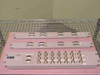 Nortel Passport 6480 front panels laid out on pink foam — balanced panels and sparing panel with DB connectors and BNC ports