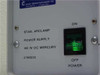 Close-up of Carl Zeiss HBO 100 front panel label reading STAB. ARCLAMP POWER SUPPLY 100 W DC MERCURY #910235 with illuminated green power switch