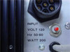 Close-up of Carl Zeiss LEP HBO 100 rear panel input rating plate: VOLT 120, Hz 50-60, WATT 200, with 7-pin lamp connector and red reset button visible