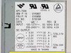 IBM API-7506 power supply label showing FRU 01K9858, IBM P/N 01K9857, input 100-240V specs, and DC output ratings