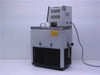 Brinkmann MGW Lauda RM6 water bath chiller — rear view showing control head vents, bath tank rear, refrigeration louvres, external circulation ports with fittings, and power cord