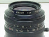 Nikon Printing-Nikkor 1:2.8 f=150mm — close-up of front element and engraved markings showing aperture and reproduction ratio scales