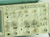 Tektronix 2230 front panel close-up showing CH1/CH2 VOLTS/DIV knobs, vertical and horizontal mode controls, trigger section, and input connectors