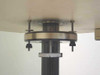 Nicolet Magnetics 800-000500 — close-up of bottom shaft and flange assembly with mounting hardware and shimming ring
