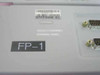 Nortel Passport NTFP99AB-02 DS3/E3 3 Channel Sparing Panel close-up showing DB9 connectors and label
