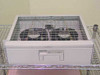 Nortel Passport 6480 DC power supply unit open view showing internal fan assembly and wiring through wire guard