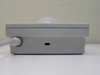 Kensington 64215 Expert Mouse trackball – left side view showing PS/2 cable exit and reset pinhole