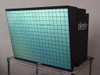 Clarity Visual Systems VN-3820-VA Leopard 38-inch rear projection LCD display — front view showing illuminated screen with grid pattern on wire shelf