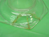 Close-up of hexagonal base showing crack repaired with yellow adhesive glue