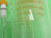 Close-up of 500mL graduation markings and spiral glass coil interior with residue deposits visible inside the coil