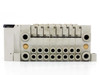 SMC EX120-SSH1 solenoid valve manifold — front port face showing 16 pneumatic push-in fittings and EXH exhaust ports across the manifold base