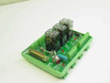 Relay PC Board 280295-001 opposite-angle view showing DB25 connector, three visible relays, red LED indicators, toggle switch, and screw terminals