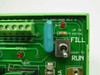 Close-up of PCB label showing P/N 1602-0400 Rev A, Fill/Run toggle switch, red LED, resistor, and terminal labels including SPILL and 3CRE