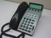 NEC DTU-8D-2 black digital office phone – front three-quarter view showing LCD display, 8 line keys, and alphanumeric keypad