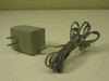 Panasonic KX-A17 9V DC 440mA wall AC adapter with coiled gray cable and barrel plug connector, full unit view