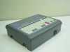 Intermec MaxiLAN DX200S barcode terminal – angled front-left view showing LCD display, QWERTY keyboard, and gray housing with power switch on right side