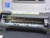Epson Stylus Photo 1280 interior view with top cover open showing print carriage rail, feed rollers, and ink cartridge bay