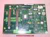 Exabyte 785400-A03 backplane PCB top side showing large central controller IC, dual edge connectors, and populated component array — front view