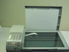HP OfficeJet 5510 scanner lid open showing flatbed glass platen and ADF document feed path