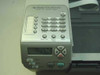 HP OfficeJet 5510 control panel close-up showing numeric keypad, LCD display, Copy/Fax/Scan buttons, and Start keys