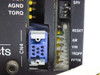 Yokogawa SR1015B82 front panel detail showing CN4 blue 9-pin mini connector and AM, VIN, TRQOFF, FFTIN terminal pins with SRV and RESET labels