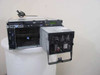 IBM 7026-H80 RS/6000 server with front bezel removed and power supply module pulled out, showing internal drive bays and chassis