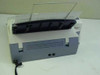 Brother FAX-565 rear view with top cover and document tray raised, showing ventilation slots and two RJ11 ports