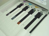 Tektronix Phaser 350 top ink-loading bay open showing four solid-ink stick slots with ink residue visible