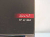 HP J3100A switch label close-up showing model number on chassis