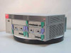 HP J3100A AdvanceStack Switch 2000 – three-quarter front view showing populated module bays and power supply