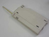 Lucent TransTalk 556E1 radio transmitter module — white plastic housing with external antenna, ventilation slots, and mounting clips