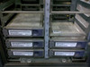 Close-up of Sun E450 SCSI hard drive bay showing six drive sleds with Seagate 2.1GB Ultra SCSI drives installed in numbered bays 0 through 9