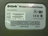 D-Link DI-614+ bottom label showing model number, serial number, MAC address, hardware version B1, firmware 2.18, FCC ID KA2ACX100