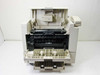 Canon LaserClass 5500 – interior view with front access panel open, showing laser toner/drum cartridge bay, paper path components, and lower paper feed mechanism with trays extended