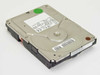 IBM DAQA-32700 3.5-inch IDE hard drive – angled top view showing platter housing, green dot sticker, and right-side label