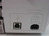 HP Deskjet 3425 rear port closeup showing USB Type-B port and 3-pin power connector with voltage ratings: +32V 250mA, +15V 530mA