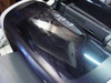 Epson Stylus C86 top cover close-up showing glossy black surface with visible light scratches and Epson logo badge