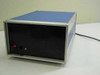 Oregon Micro Systems MD10A 4-axis microstepper controller box — front panel showing power switch and green LED indicator, blue and aluminum enclosure