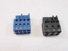 Both WAGO pluggable connector blocks removed — blue 4-terminal output block (+/+/−/−) on left and black 3-terminal input block (L/N/GND) on right