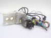 HC6038TM12 120V 75W AC motor disassembled — motor with wiring harness and plastic gear housing shown separated