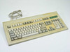 BTC 5339R-0 AT Keyboard 53 Series – top-down front view showing full 101-key layout with yellowed beige housing and coiled cord