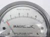 Dwyer 2005 Magnehelic gauge face close-up showing 'Inches of Water' scale 0–5, red caution label, MAX. PRESSURE 15 PSIG, and CAT. NO. 2005 by Dwyer Instruments Inc.