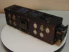 Microcomputer Power CP129 power supply – side view showing output transistors, transformer, and attached cooling fan with cracked housing