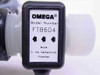 Omega Engineering FTB604 model label showing brand, model number, flow direction arrows, and Made in the Netherlands text