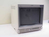 Sony PVM-1353MD 14-inch Trinitron Color Video Monitor — front 3/4 view showing housing, screen with handwritten marker notation, Sony logo, and front panel controls